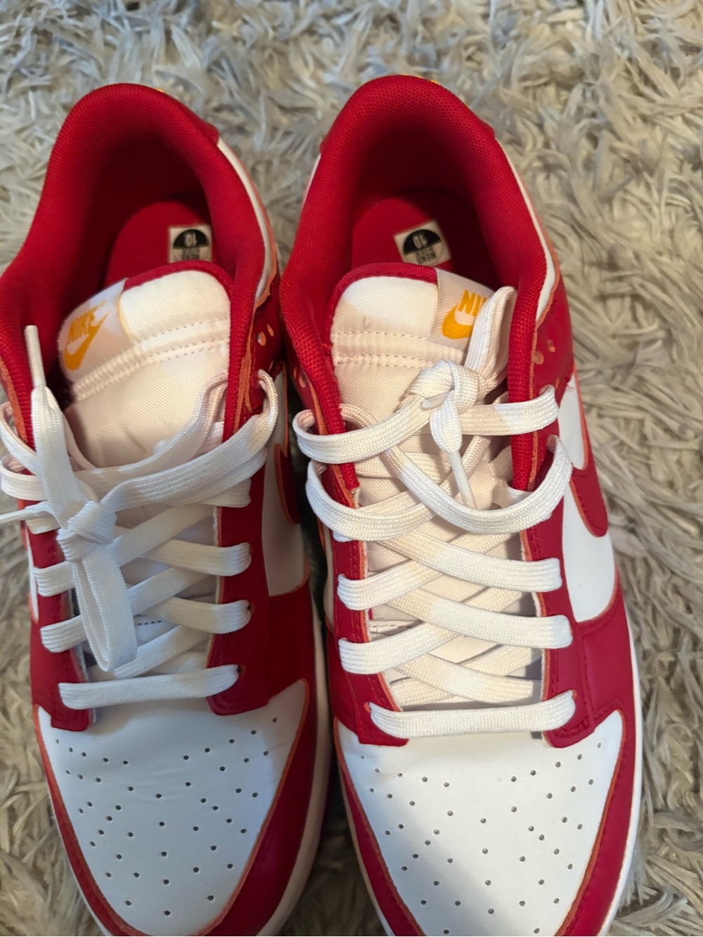 Nike White and Red Low-Top Sneakers with Yellow Logo
